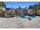 Luxury home featuring a stunning pool with stone surround and meticulously landscaped grounds at 3685 Paces Ferry Nw Rd, Atlanta, GA 30327
