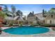 Luxurious backyard pool area with spa, lush landscaping, and expansive patio space at 3685 Paces Ferry Nw Rd, Atlanta, GA 30327