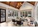 Bright sun room with large windows and tile floors at 3685 Paces Ferry Nw Rd, Atlanta, GA 30327