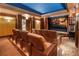 Home theater room with reclining seats and a large screen at 3685 Paces Ferry Nw Rd, Atlanta, GA 30327