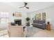 Bright living room with fireplace and hardwood floors at 13 Hunters Vw, Kingston, GA 30145