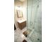 Updated bathroom with marble tile and a walk-in shower at 1401 Boulevard Se, Atlanta, GA 30315