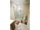 Modern bathroom with marble tile and a glass shower at 1401 Boulevard Se, Atlanta, GA 30315