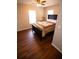 Bright bedroom with a dark brown bed frame and hardwood floors at 1401 Boulevard Se, Atlanta, GA 30315