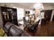 Open concept dining area features a glass table and hardwood floors at 1401 Boulevard Se, Atlanta, GA 30315
