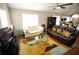 Bright living room with comfy sofas, a coffee table, and hardwood floors at 1401 Boulevard Se, Atlanta, GA 30315