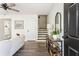 Bright and airy entryway with stairs and console table at 211 Morris Ln, Woodstock, GA 30188