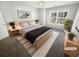 Virtually staged bedroom with large window and modern dresser at 5431 Village Green Sq # 1018, Norcross, GA 30093