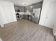 Modern kitchen with gray cabinets and stainless steel appliances at 5431 Village Green Sq # 1018, Norcross, GA 30093