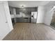 Modern kitchen with gray cabinets and stainless steel appliances at 5431 Village Green Sq # 1018, Norcross, GA 30093