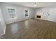 Spacious living room featuring hardwood floors and a fireplace at 5431 Village Green Sq # 1018, Norcross, GA 30093