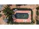 Aerial view of a community pool with lounge chairs and a neat hedge border surrounding the area at 5431 Village Green Sq # 1018, Norcross, GA 30093