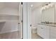 Bathroom with vanity, toilet and access to closet at 113 Creekview Ln, Canton, GA 30115