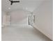 Bright bedroom featuring a ceiling fan and ample space at 113 Creekview Ln, Canton, GA 30115