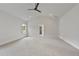 Spacious bedroom with high ceiling, carpet, and large windows at 113 Creekview Ln, Canton, GA 30115