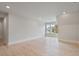 Spacious bonus room with hardwood floors and a large window at 113 Creekview Ln, Canton, GA 30115