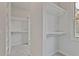 Spacious walk-in closet with ample shelving and hanging space at 113 Creekview Ln, Canton, GA 30115