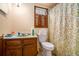 Small bathroom with a toilet and shower at 3059 Sorrento Sw Cir, Atlanta, GA 30331