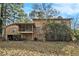 Back view of house showcasing screened porch at 3059 Sorrento Sw Cir, Atlanta, GA 30331