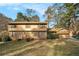 Two-story house with attached garage and spacious yard at 3059 Sorrento Sw Cir, Atlanta, GA 30331