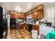 Kitchen with wood cabinets and checkered tile floor at 3059 Sorrento Sw Cir, Atlanta, GA 30331