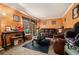 Living room with brown leather couches and a coffee table at 3059 Sorrento Sw Cir, Atlanta, GA 30331