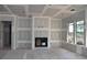 Unfurnished room with drywall and a fireplace, ready for finishing at 5424 Gallaghar Ct, Powder Springs, GA 30127