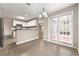 Eat-in kitchen area boasting white cabinets, granite countertops, and stainless steel appliances at 2065 Arbor Forest Sw Dr, Marietta, GA 30064