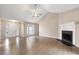 Bright living room boasting vaulted ceilings, a cozy fireplace, and large window at 2065 Arbor Forest Sw Dr, Marietta, GA 30064