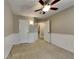 Spacious bedroom with carpet, ceiling fan and access to another room at 2065 Arbor Forest Sw Dr, Marietta, GA 30064