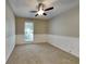 Bedroom with carpet flooring, ceiling fan and wainscoting at 2065 Arbor Forest Sw Dr, Marietta, GA 30064