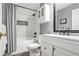 Bathroom with tub/shower combo, white vanity and gray walls at 6242 Mountain Ridge Cir, Sugar Hill, GA 30518