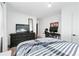 Spacious bedroom with a large dresser and striped bedding at 1505 Jamerson Lndg, Marietta, GA 30066