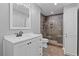 Basement bathroom with updated vanity and shower at 5480 Landseer Way, Cumming, GA 30040