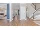 Bright and spacious entryway with hardwood floors and staircase at 5480 Landseer Way, Cumming, GA 30040