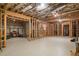 Unfinished basement with framed rooms and ample storage at 830 Camden Park Ne Ct, Atlanta, GA 30342