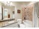 Elegant bathroom with granite countertop, soaking tub, and shower at 830 Camden Park Ne Ct, Atlanta, GA 30342