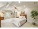 Serene bedroom with a queen-size bed and dormer window at 830 Camden Park Ne Ct, Atlanta, GA 30342