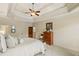 Bright bedroom with a king-size bed and ample closet space at 830 Camden Park Ne Ct, Atlanta, GA 30342