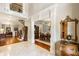Bright two-story foyer with hardwood floors and views to dining room at 830 Camden Park Ne Ct, Atlanta, GA 30342