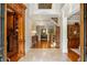 Elegant entryway with hardwood floors and a grand staircase at 830 Camden Park Ne Ct, Atlanta, GA 30342