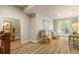Bright and airy hallway with hardwood floors and access to backyard at 830 Camden Park Ne Ct, Atlanta, GA 30342