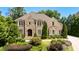 Impeccably maintained home with stone and brick exterior at 830 Camden Park Ne Ct, Atlanta, GA 30342