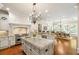 Spacious kitchen features large island, stainless steel appliances, and hardwood floors at 830 Camden Park Ne Ct, Atlanta, GA 30342