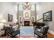 Spacious living room with fireplace and large windows at 830 Camden Park Ne Ct, Atlanta, GA 30342