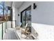 Private balcony with wicker chairs and a view of trees at 1494 Red Fox Ne Dr # D, Atlanta, GA 30306