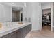 Double vanity bathroom with a large mirror and walk-in closet at 1494 Red Fox Ne Dr # D, Atlanta, GA 30306