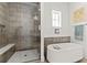 Spa-like bathroom with a soaking tub and walk-in shower at 1494 Red Fox Ne Dr # D, Atlanta, GA 30306