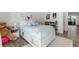 bedroom with a white bed, built-in storage, and access to hallway at 1494 Red Fox Ne Dr # D, Atlanta, GA 30306