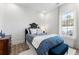Cozy bedroom with a queen-size bed and stylish decor at 1494 Red Fox Ne Dr # D, Atlanta, GA 30306